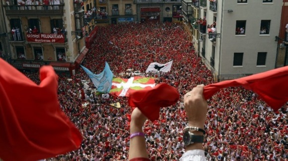 Revellers on the town hall balcony.