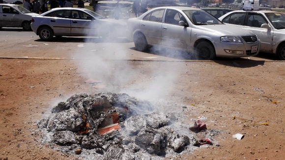 Used ballot booklets set alight in Benghazi, Libya