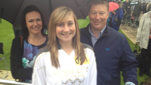 Alice, with proud mum and dad Sasha and Colin