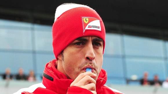 Ferrari's Fernado Alonso during the drivers parade before the British Grand Prix at Silverstone Circuit