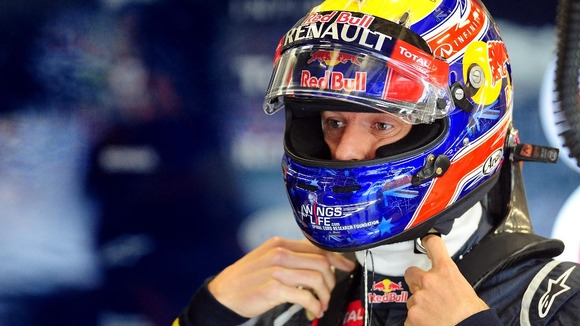 Red Bull Racing's Mark Webber in the pits during the third practice session of the British Grand Prix at Silverstone Circuit, Silverstone.