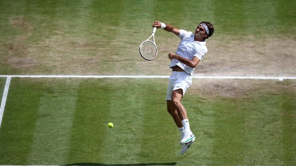 Switzerland's Roger Federer in action against Great Britain's Andy Murray