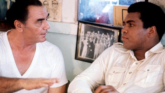 A scene from the film 'The Greatest', starring Muhammad Ali as himself and Ernest Borgnine as trainer Angelo Dundee