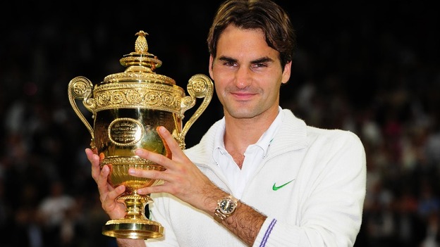 Roger Federer with his winners trophy