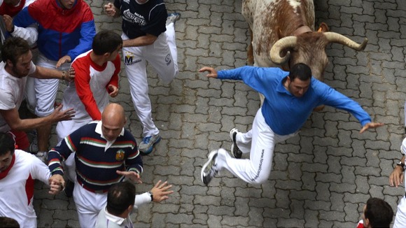 Three men were injured when a bull broke away and charged runners at the Pamplona bull run