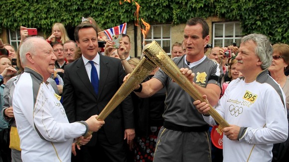 Number 094 Clive Stone MBE (left) is the Prime Minister's nominated Torch Bearer