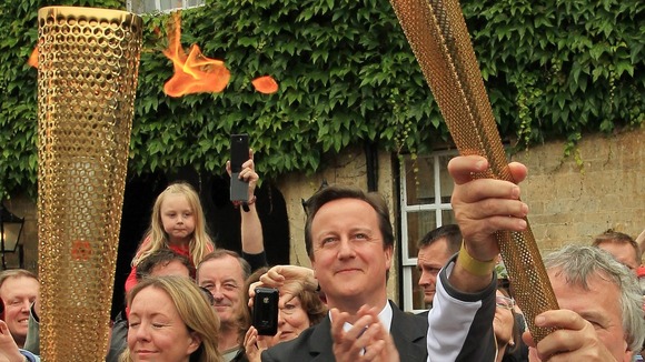 David Cameron seeing the Olympic Torch for himself in Woodstock, West Oxfordshire