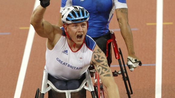 David Weir celebrates after winning gold at the Beijing Olympic Games in 2008.
