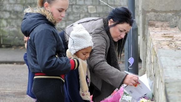 Mourners lay tributes following the death of Casey Kearney.