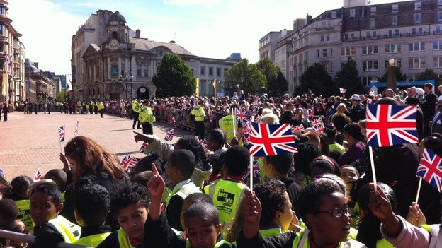 Hundreds of schoolchildren wait for Royal party to arrive in Victoria Square