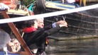 Ribbon being cut over a canal in Birmingham to mark the handover to the Canal & River Trust