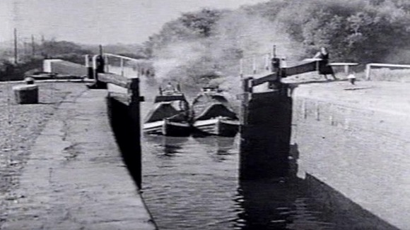 Archive pictures of boats using the Grand Union Canal to carry freight