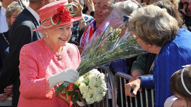 The Queen accepts some flowers