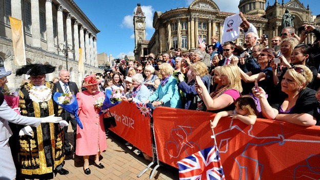 The crowds celebrate as The Queen arrives in Birmingham