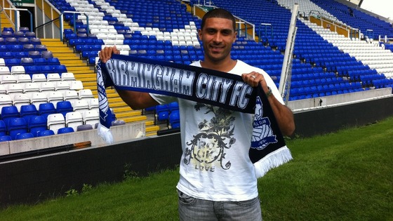 Hayden Mullins waving his Blues scarf today