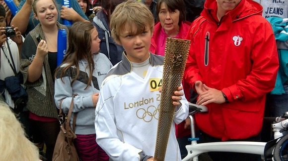 Freddie Wright holds the torch