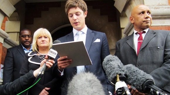 Kane Gorny's mother Rita Cronin stands by the side of her lawyer, James Stevens,