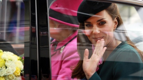 Kate waves goodbye to the people of Leicester
