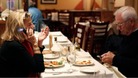 Diners on the phone in a restaurant
