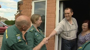 Simon Bakewell meeting the paramedics who helped save his life