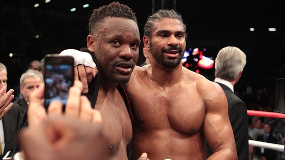 The boxers embrace after the bout.