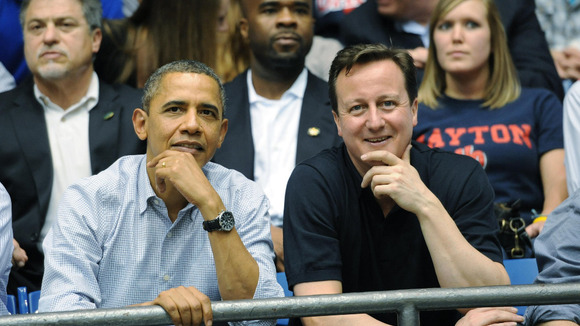 Prime Minister David Cameron and US President Barack Obama in Ohio as they watch a basketball game