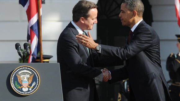 Prime Minister David Cameron and US President Barack Obama greet each other at the official welcoming ceremony