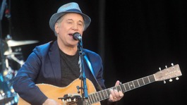 Paul Simon plays at the Hard Rock Calling music festival in Hyde Park, London