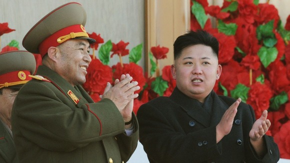North Korean leader Kim Jong-Un with Ri Yong-ho.