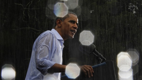 A soaked Obama speaks at a rally in Virginia.