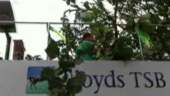 Olympic Torch bus collides with a low lying tree