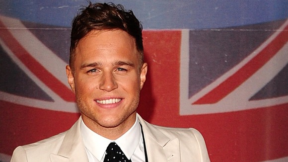 The singer Olly Murs slipped on some wet stairs during his performance at Guilfest.