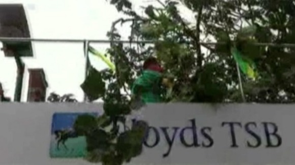 Olympic Torch bus collides with a low lying tree