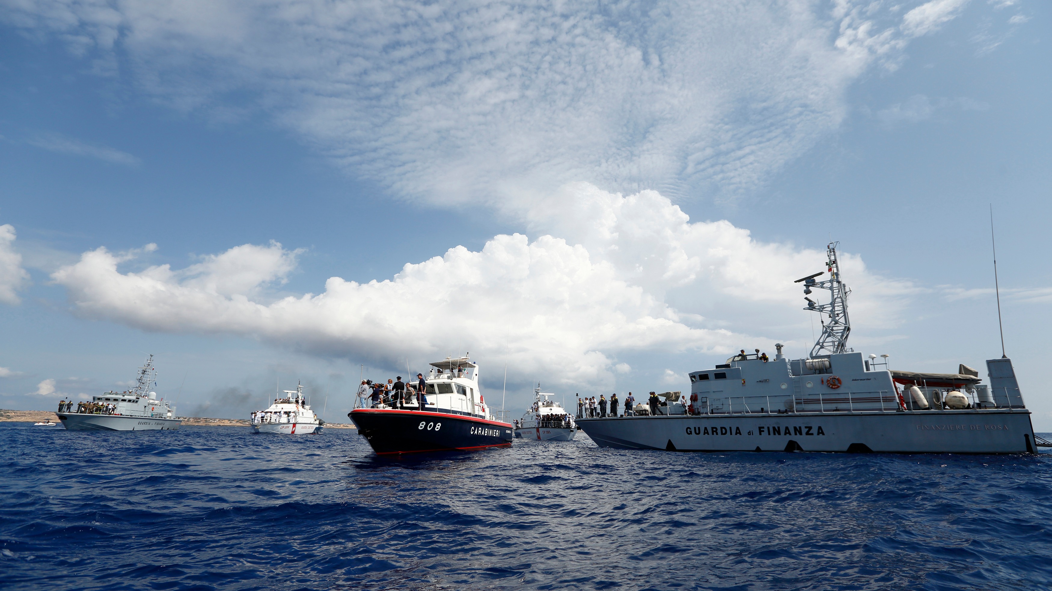 EU says over 7,000 migrants rescued off Italy since Friday.