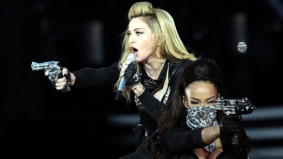 Madonna performs on stage in Hyde Park, London, as part of her MDNA tour