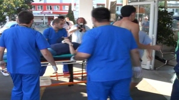 A casualty is taken into hospital to treat injuries sustained in the blast.