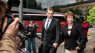 PC Simon Harwood, and his wife Helen, arrive at Southwark Crown Court