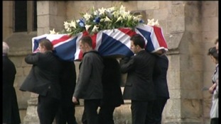 Coffin arriving at church