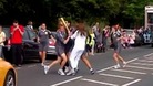Security guards surround the Olympic Torch