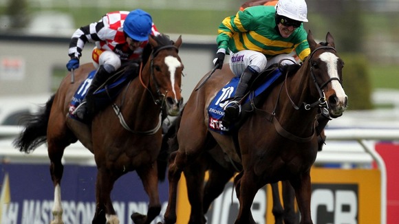 Tony McCoy rides to victory in the Cheltenham Gold Cup on Synchronised