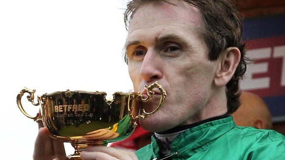 Jockey Tony McCoy celebrates his second Gold Cup win