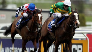 Tony McCoy rides to victory in the Cheltenham Gold Cup on Synchronised