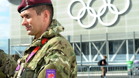 British Army personnel patrol the Olympic Park in Stratford, as preparations continue for the London 2012 Olympics.