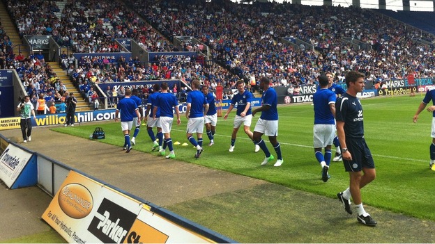 Training by the pitch in front of thousands of fans