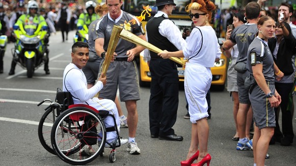 The Olympic flame arrived into the grounds of the Tower of London on Friday.