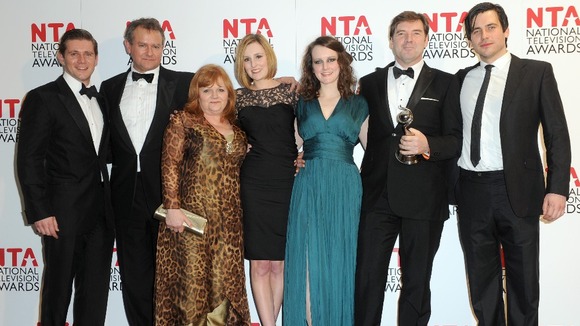 The Downton Abbey cast Allen Leech, Hugh Bonneville, Lesley Nicol, Laura Carmichael, Sophie McShera, Brendan Coyle and Rob James-Collier.
