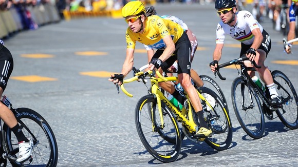 Bradley Wiggins of Sky Pro Racing (yellow jersey), followed by team mate Mark Cavendish, during Stage 20 of the Tour de France