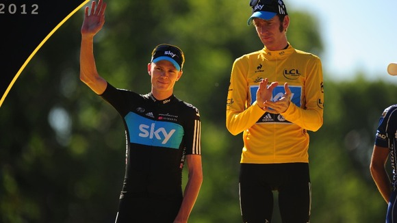 Bradley Wiggins of Sky Pro Racing acknowledges second placed rider and team mate, Chris Froome as they stand on the winners podium