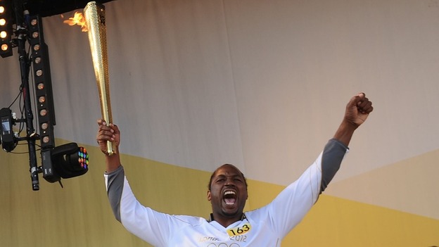 Torchbearer 163 Lennox Lewis lighting the cauldron at the end of Day 65