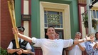 Eastenders character Billy Mitchell played by Perry Fenwick carries the Olympic torch